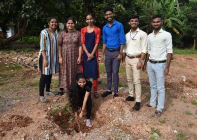 Eco Club members plant fruit-bearing saplings